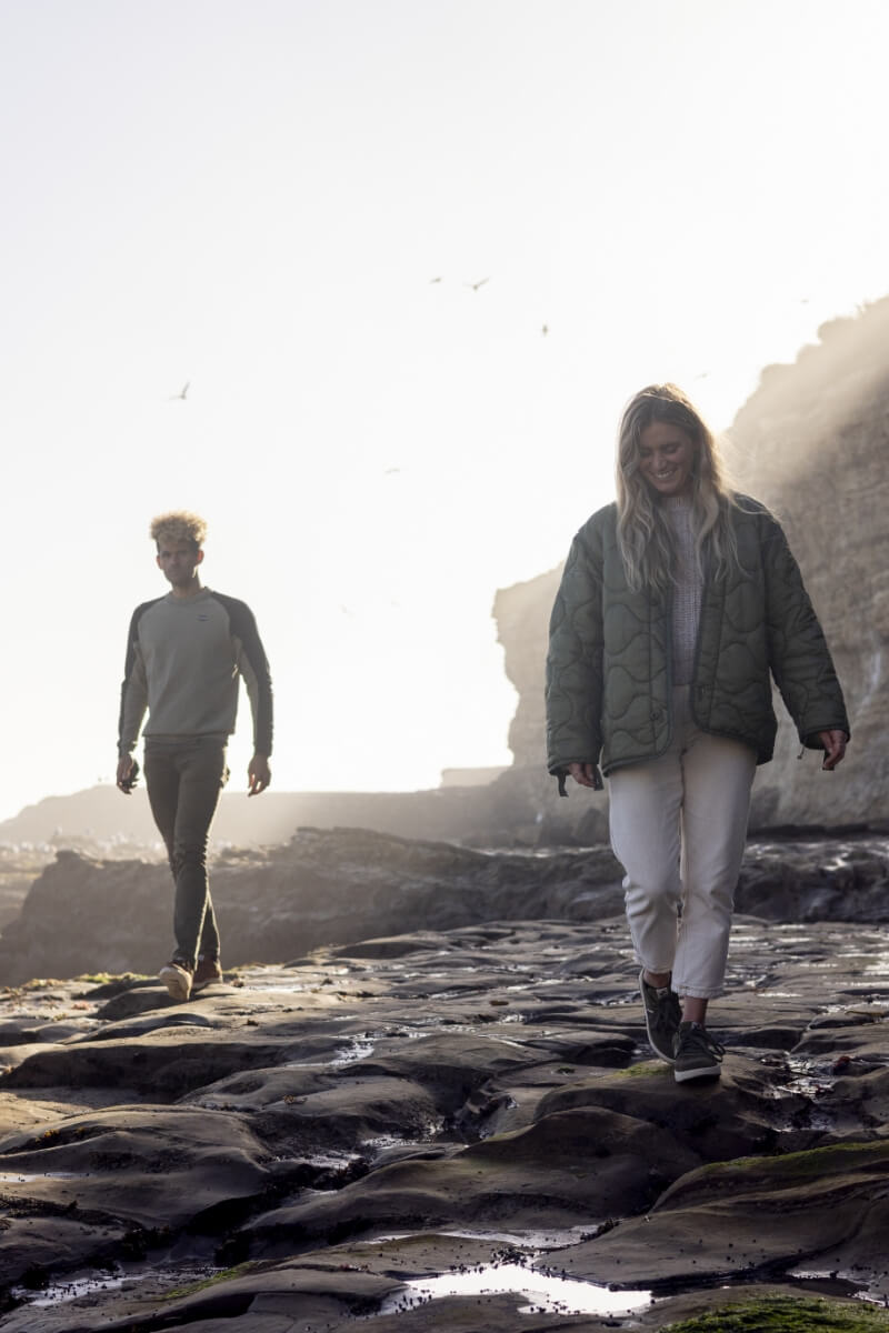 The featured image shows two people wearing Forsake shoes walking on rocks.